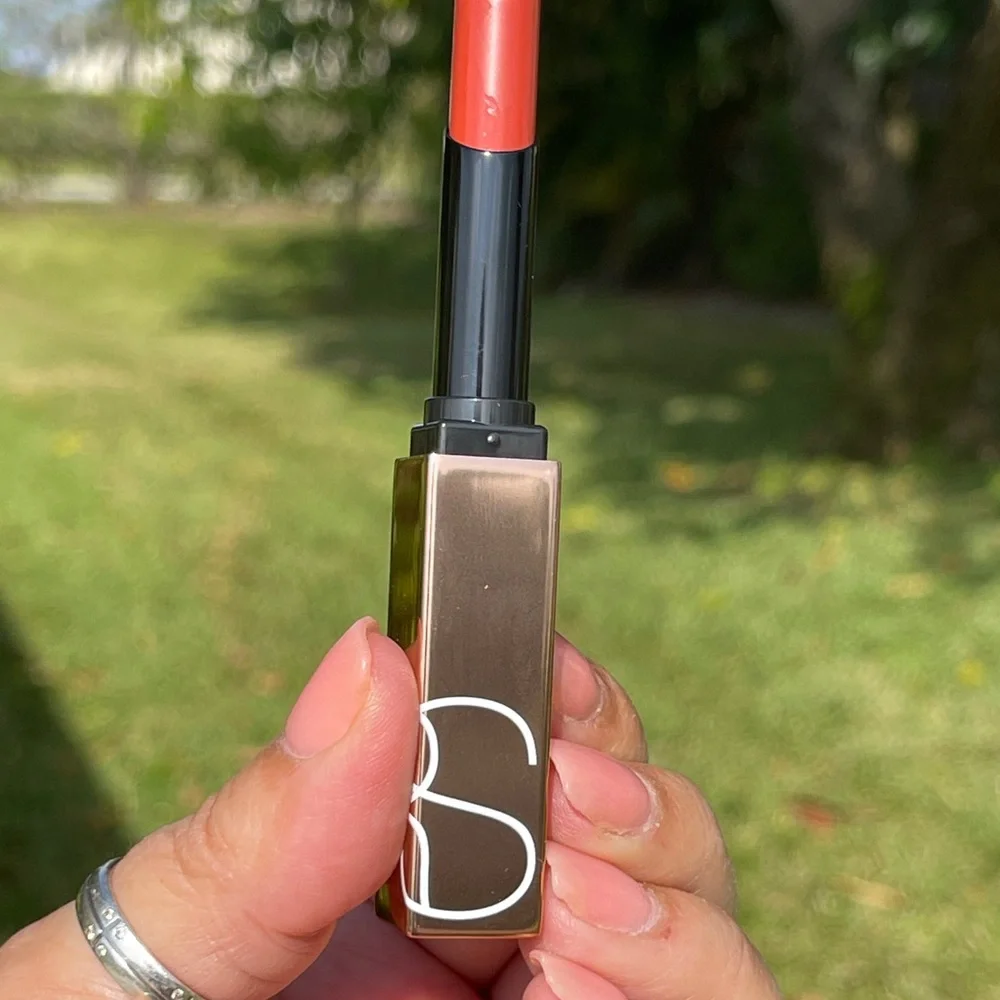 NARS Afterglow Sensual Shine Lipstick In (High Gear 218) Burnished Coral